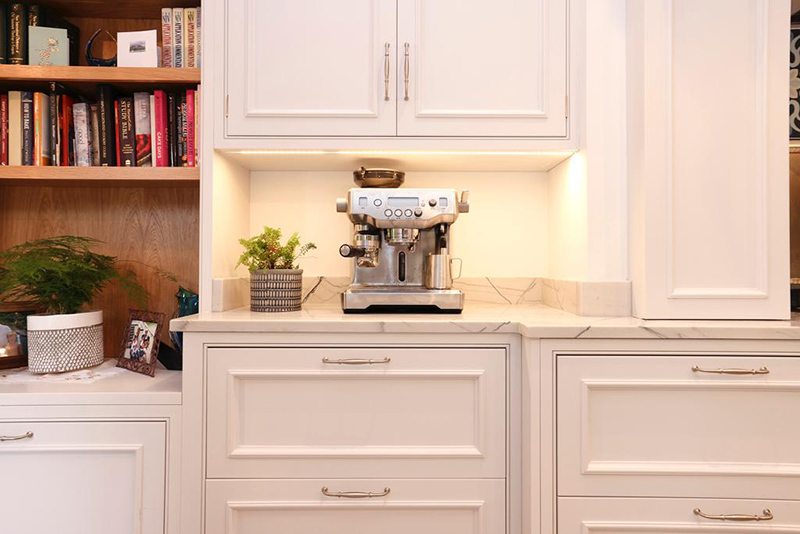 spraying kitchen cabinets